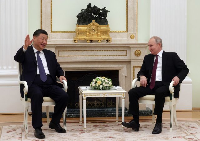 Čínský prezident Si Ťin-pching a jeho ruský protějšek Vladimir Putin