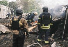 Následky zásahů raket ve městě Charkov